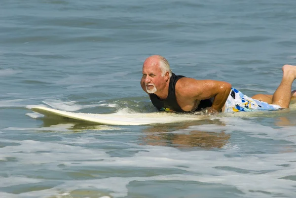 stock image Senior on Surfboard