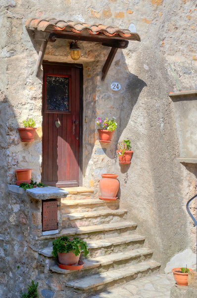 Saint Guilhem France doorway decorated with with flowers