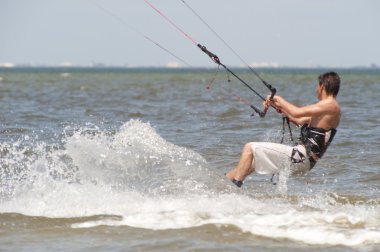 Kitesurfing on the Indian River Lagoon clipart