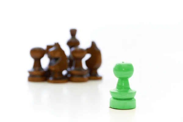 Chess Pieces with a Opposite Leader — Stock Photo, Image