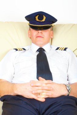 Airline pilot resting clipart
