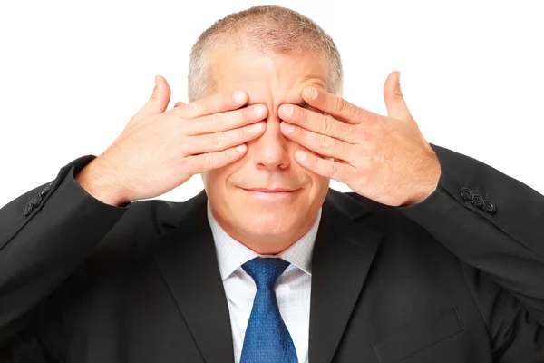 Portrait of business man covering eyes — Stock Photo, Image