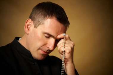 Praying priest clipart