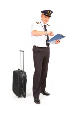 Airline pilot checking time clipart