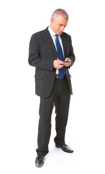 Портрет бизнесмена с мобильным телефоном — стоковое фото