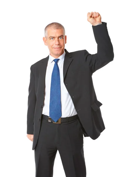 Успешный бизнесмен с поднятой рукой — стоковое фото
