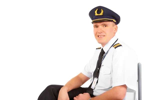 Piloto de linha aérea sentado — Fotografia de Stock