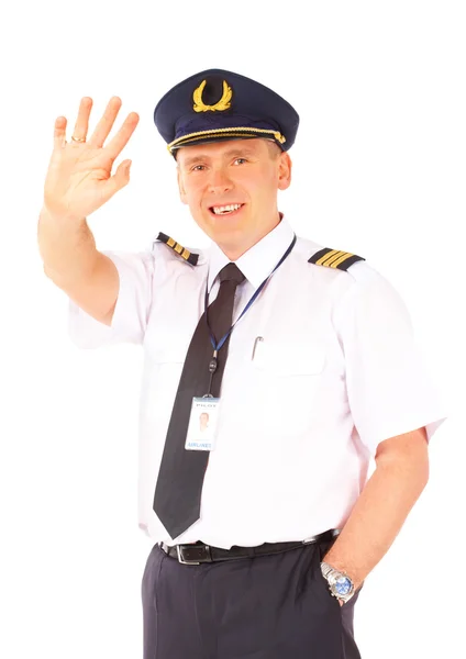 Piloto de aerolínea saludando — Foto de Stock