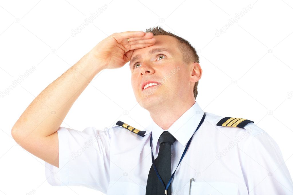 Airline pilot looking upwards