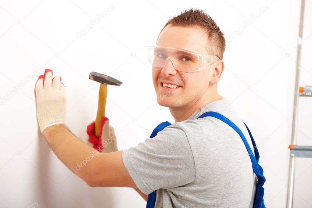 Man working with hammer