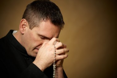 Praying priest clipart