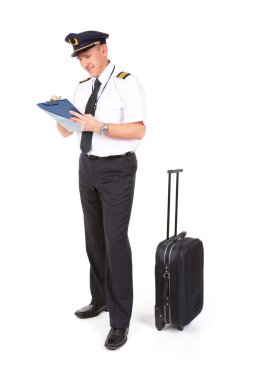 Airline pilot filling in papers clipart