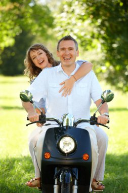 Couple riding clipart