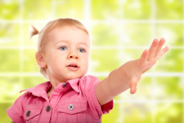 Cute Baby Girl Reaching For Something clipart