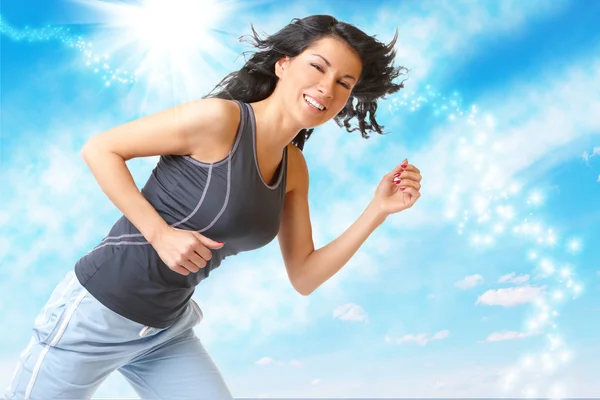 Young woman running outside — Stock Photo, Image