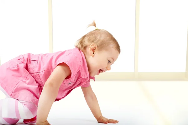 Cute baby girl crawling — Stock Photo, Image