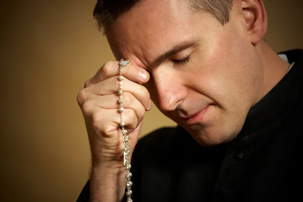 Praying priest — Stock Photo, Image