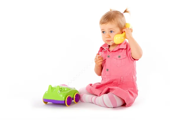 Ребенок с телефоном — стоковое фото