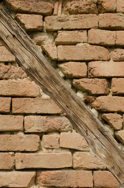 Brick wall with beams — Stock Photo, Image