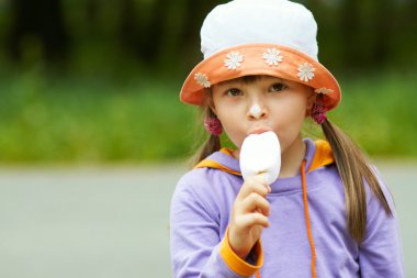 Girl eating ice cream clipart