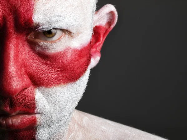 Homme au visage peint avec le drapeau de l'Angleterre — Photo