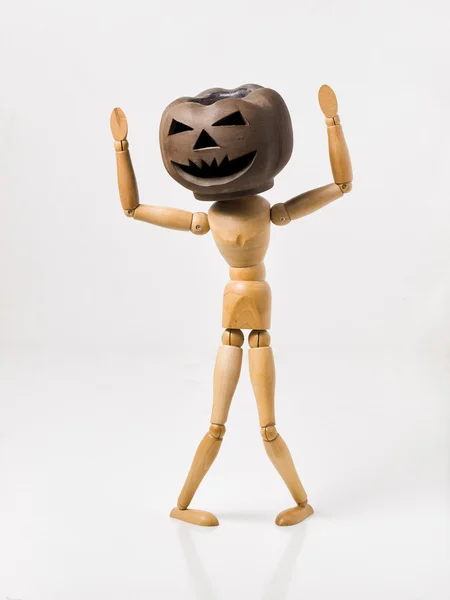 Pumpkin head doll and hands up — Stock Photo, Image