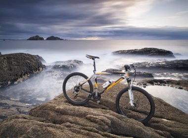 Bicycle on the coast clipart