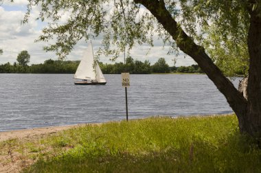 Sailboat on Creve Couer Lake clipart