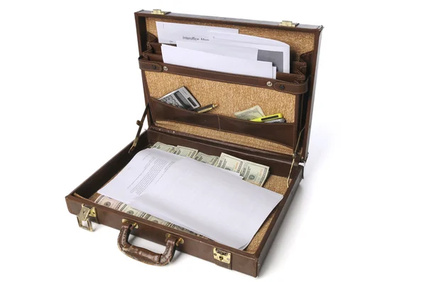 Briefcase with cash and business supplies — Stock Photo, Image