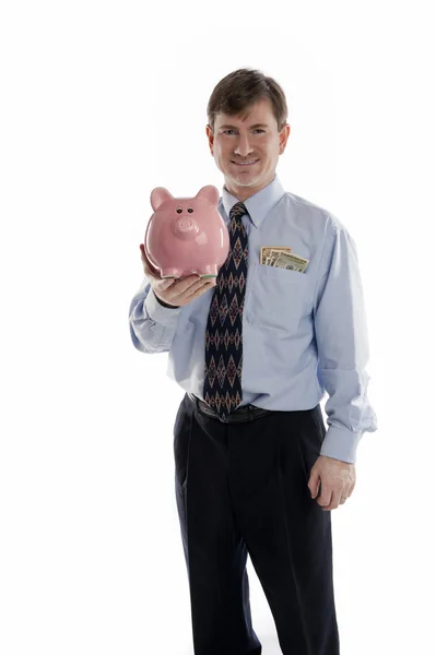 Biznesmen gospodarstwa piggy bank — Zdjęcie stockowe