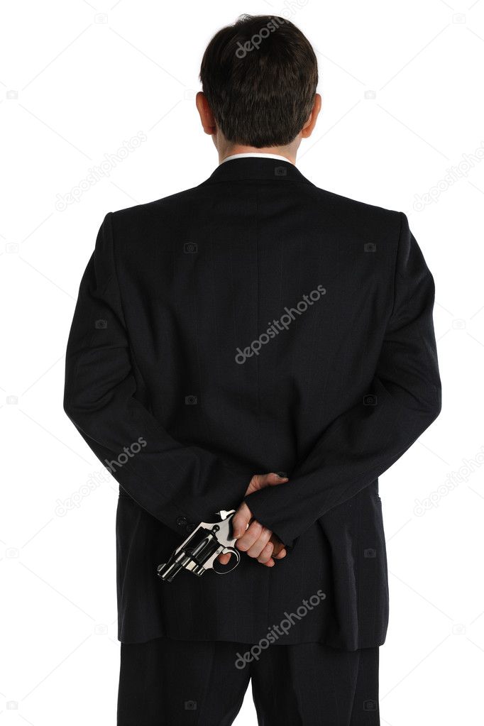 Pistol behind the suit