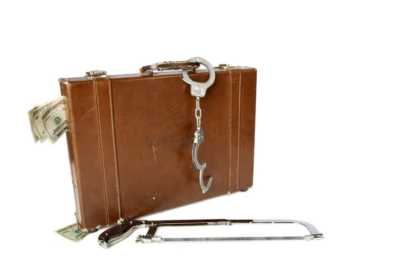 Briefcase handcuffs and saw — Stock Photo, Image