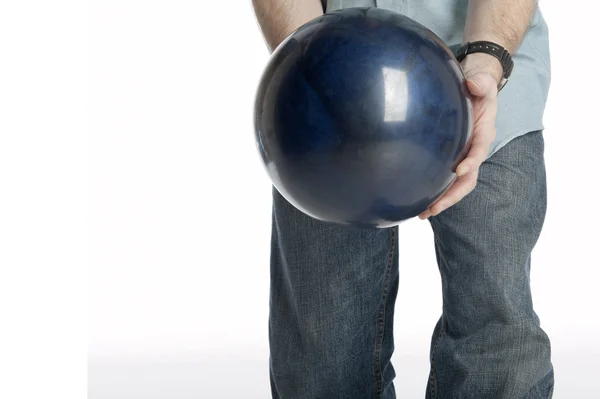 Bowler holding a bowling ball — Stock Photo, Image
