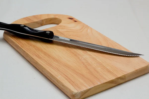 Nůž a řezací deska — Stock fotografie