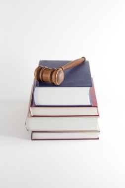 Gavel Atop Legal Texts clipart