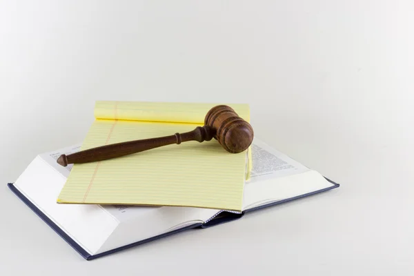 Gavel Atop Legal Texts — Stock Photo, Image