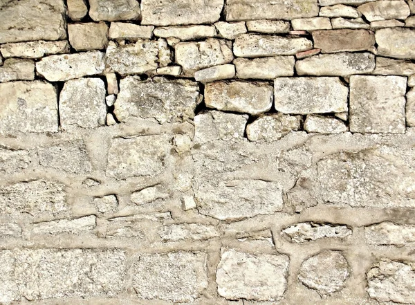 Gebrauchter Hintergrund der Steinmauer — Stockfoto