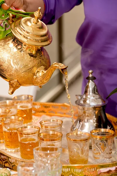 stock image Arabic tea served in a golden teapot