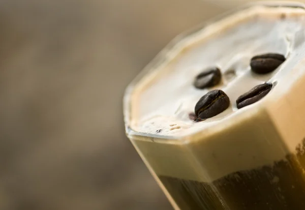 Ice coffee with coffee beans — Stock Photo, Image
