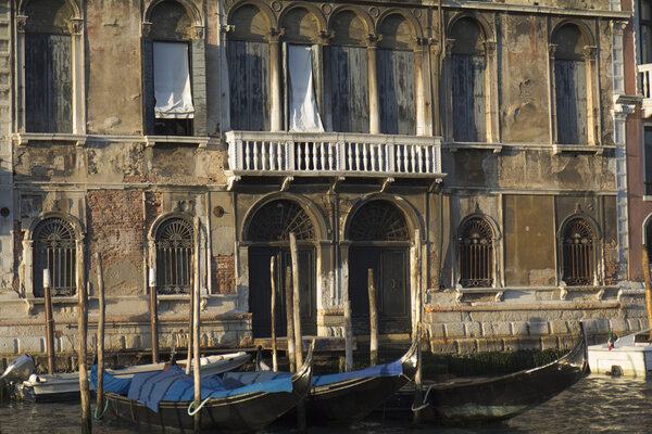 Venice, Italy - November 25, 2011: Very old facade of a historic building along the Grand Canal.