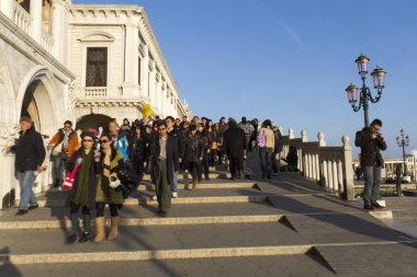 Group of tourists walking clipart