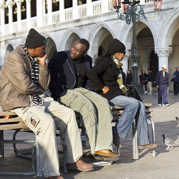 Three are sitting on a bench — Stock Photo, Image