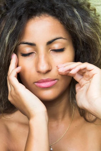 stock image Young woman with eyes closed.