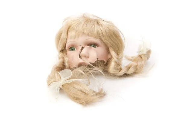 Testa di bambola in porcellana rotta Immagini Stock Royalty Free