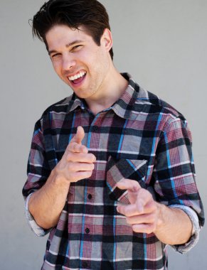 Portrait of an energetic young man with hand gestures clipart