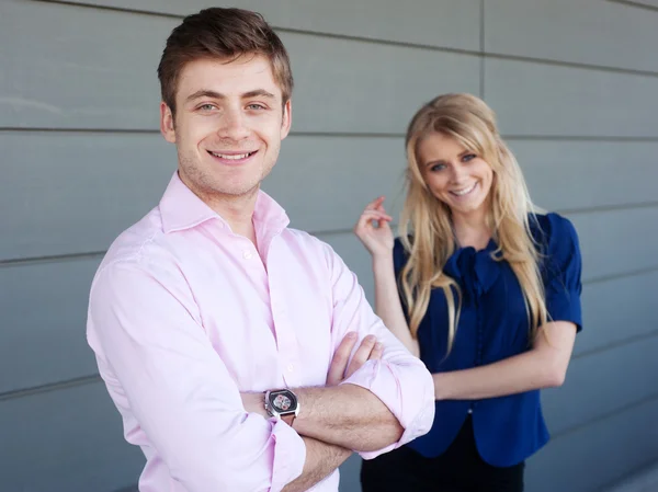 Portrait of a young businessman and businesswoman — Stock Photo, Image