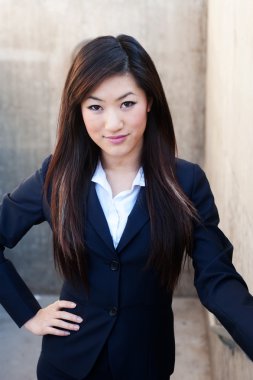 Young attractive asian businesswoman clipart
