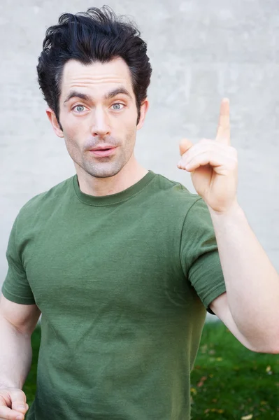 stock image Portrait of a young man with lightbulb moment