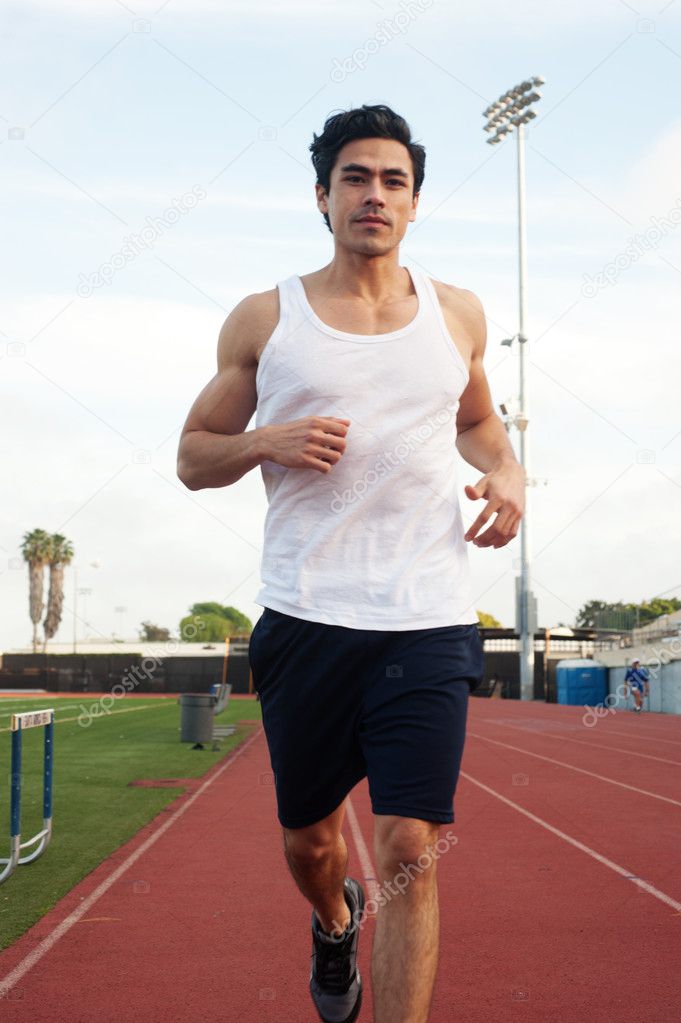 Handsome, young latino runner