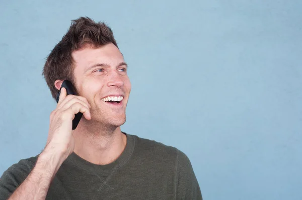 Portrait of a young handsome man on the cell phone — Stock Photo, Image